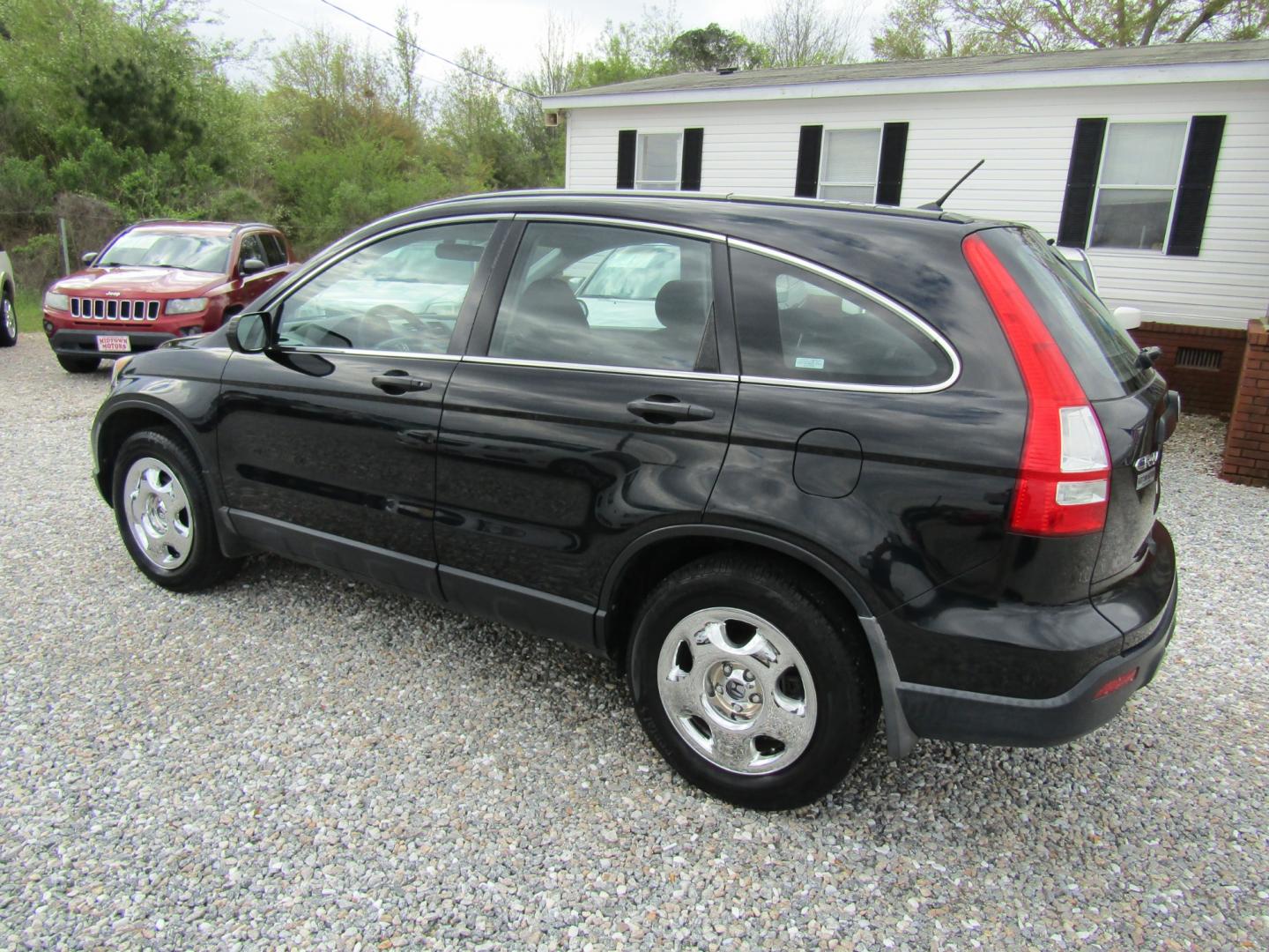 2009 Black Honda CR-V LX 2WD 5-Speed AT (3CZRE383X9G) with an 2.4L L4 DOHC 16V engine, Automatic transmission, located at 15016 S Hwy 231, Midland City, AL, 36350, (334) 983-3001, 31.306210, -85.495277 - Photo#5